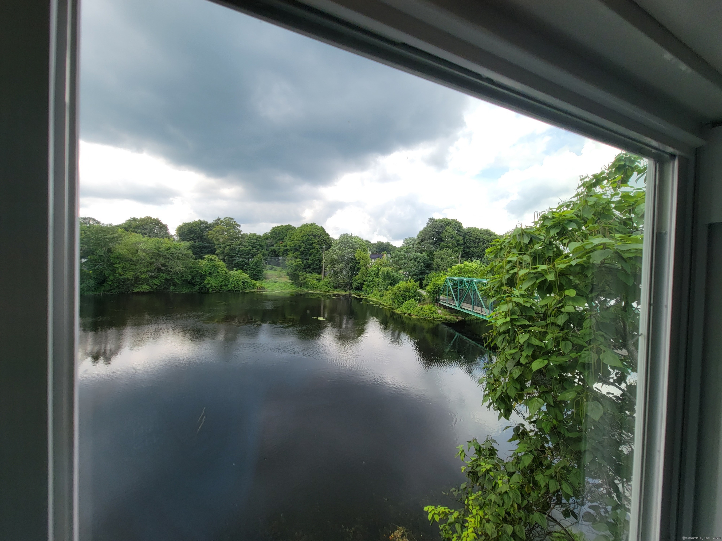 3 Water Street Killingly, CT 06239 - Photo 33 of 38 a view of a lake from a window