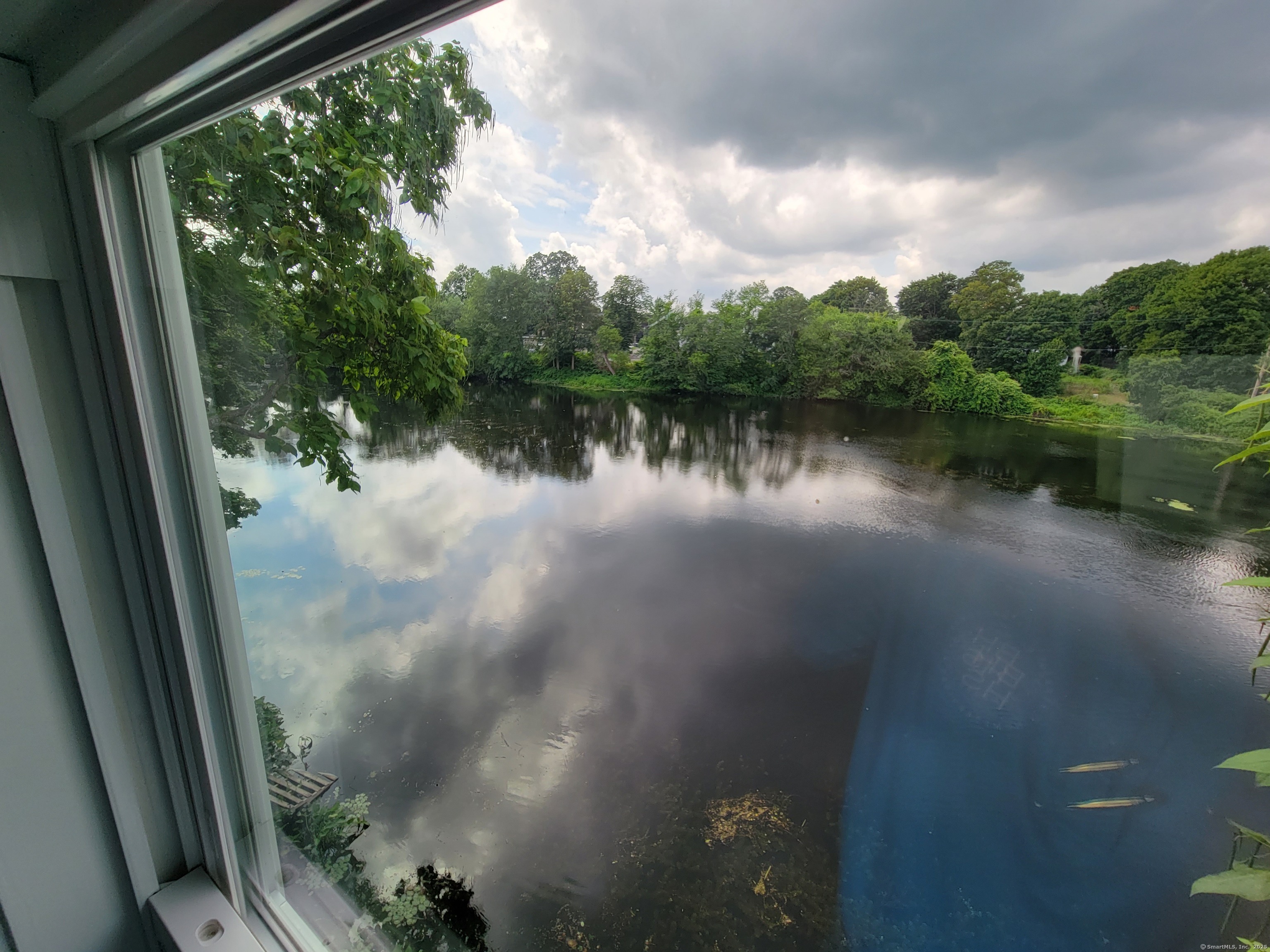 3 Water Street Killingly, CT 06239 - Photo 34 of 38 a view of a lake from a balcony