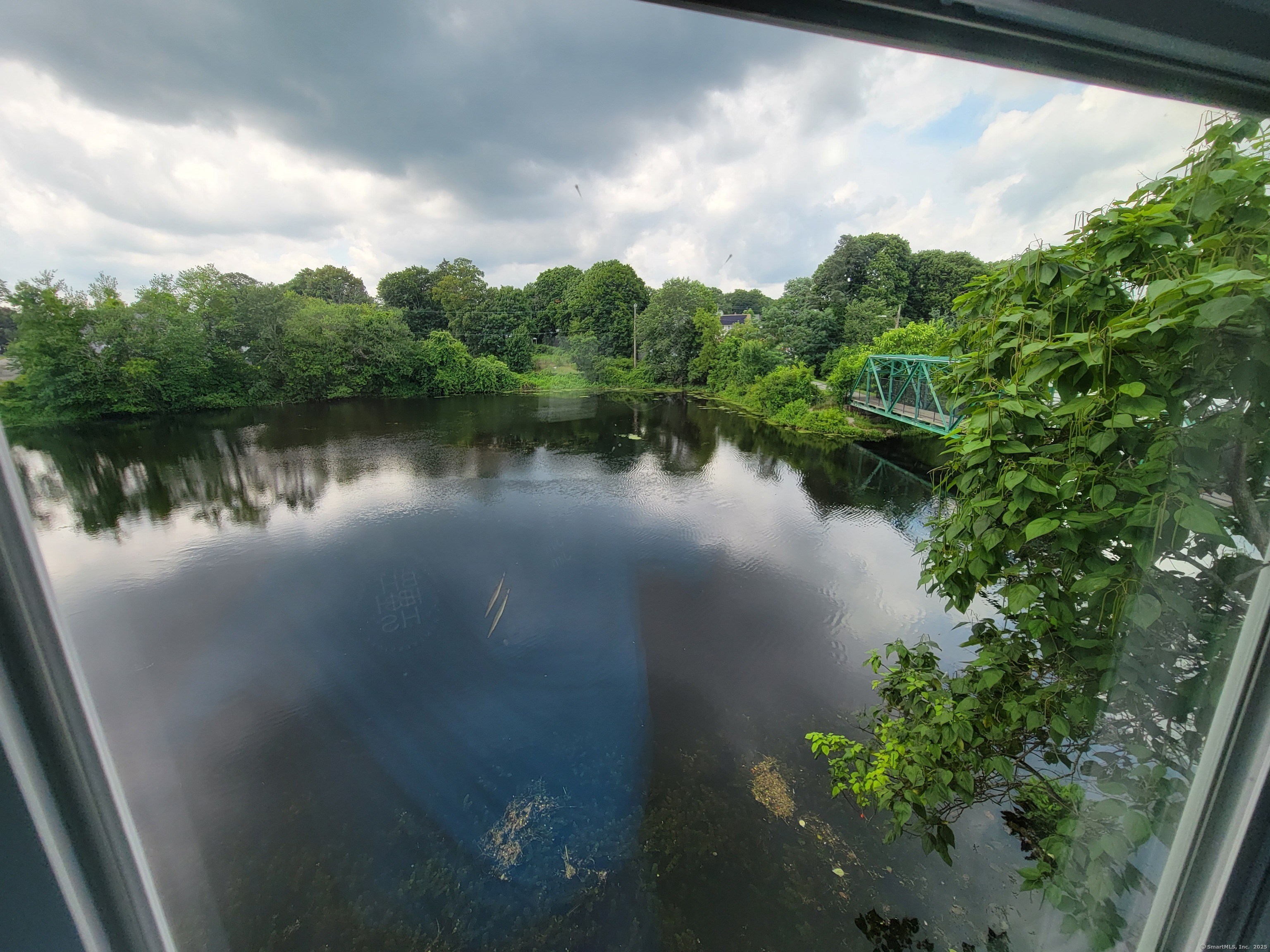 3 Water Street Killingly, CT 06239 - Photo 37 of 38 a view of a lake with a city