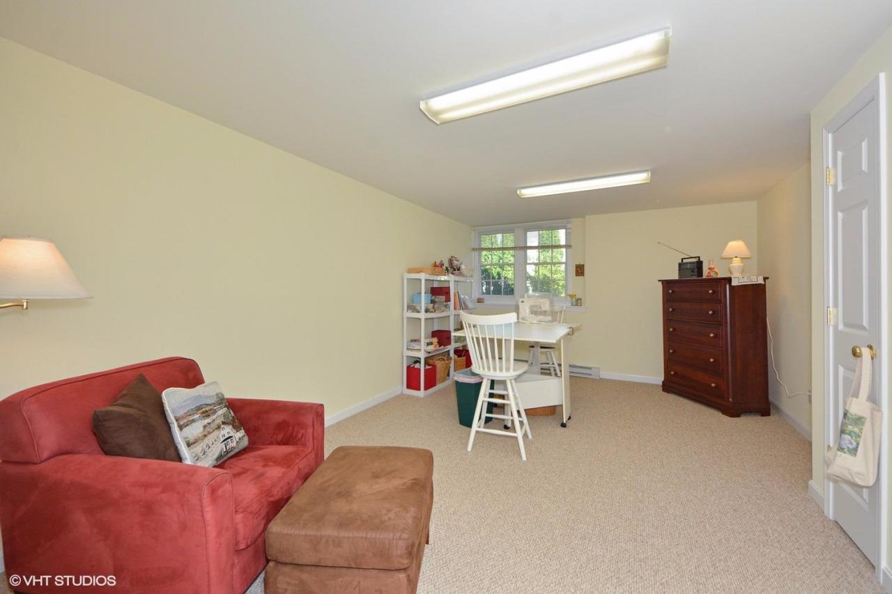 92 Falling Leaf Lane Osterville, MA 02655 - Photo 11 of 15 a living room with furniture and a wooden floor