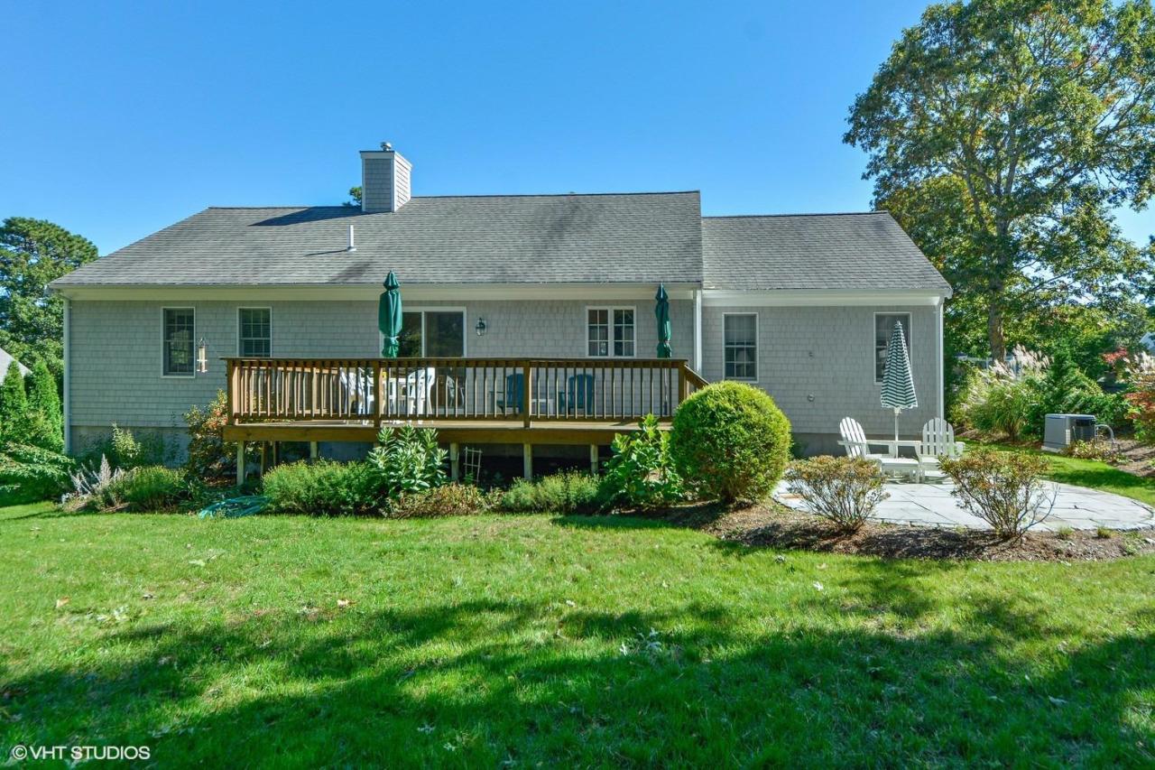 92 Falling Leaf Lane Osterville, MA 02655 - Photo 15 of 15 a front view of a house with a yard