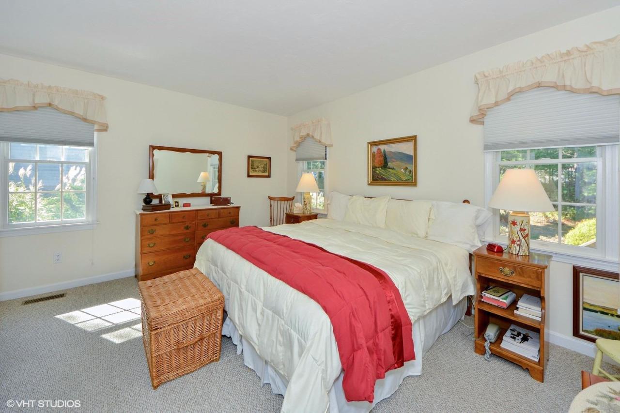 92 Falling Leaf Lane Osterville, MA 02655 - Photo 8 of 15 a bedroom with a bed window and dresser
