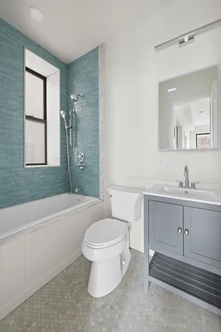 an empty room with wooden floor