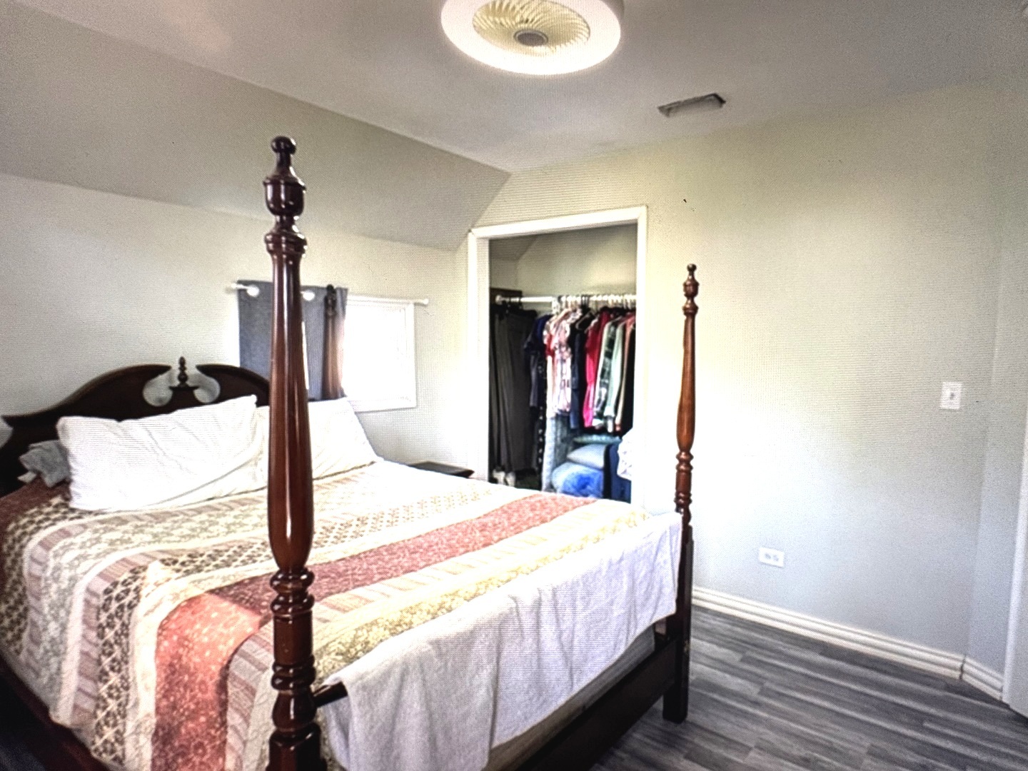 307 Mills Road Joliet, IL 60433 - Photo 17 of 22 a bedroom with a bed and a mirror