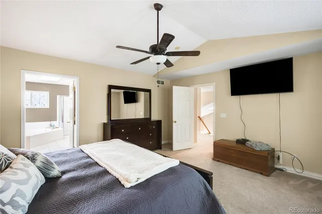 a bathroom with a tub and a sink