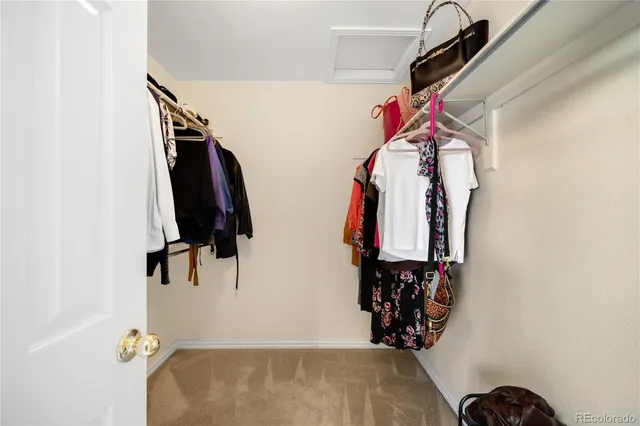 a bathroom with a sink vanity mirror and toilet
