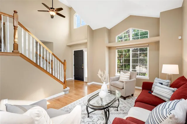 a living room with furniture or couch and a table