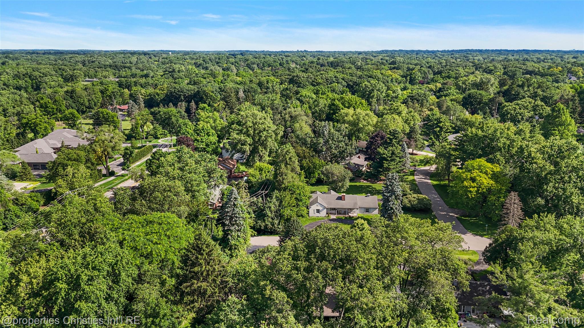 27331 Gardenway Road Franklin, MI 48025 - Photo 18 of 65 Expansive aerial showcasing a residential neighborhood surrounded by abundant mature trees
