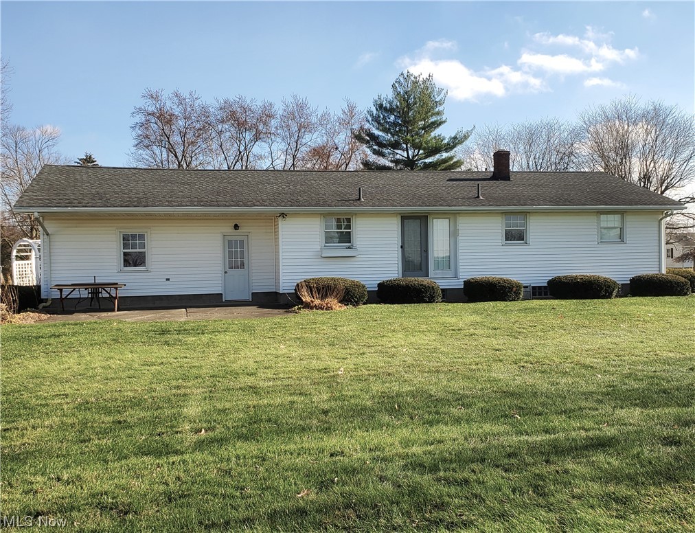 249 Rufener Street Rittman, OH 44270 - Photo 2 of 36 Rear view of property with concrete patio