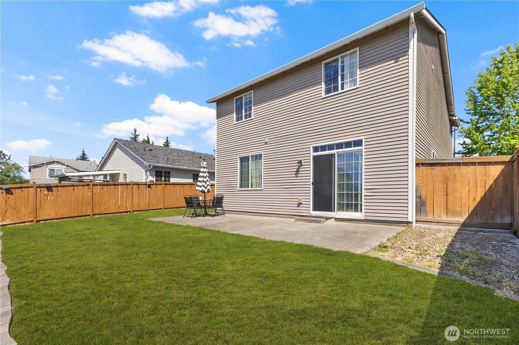 8305 Sweetbrier Loop Southeast Olympia, WA 98513 - Photo 38 of 40 a view of a house with a yard and sitting area