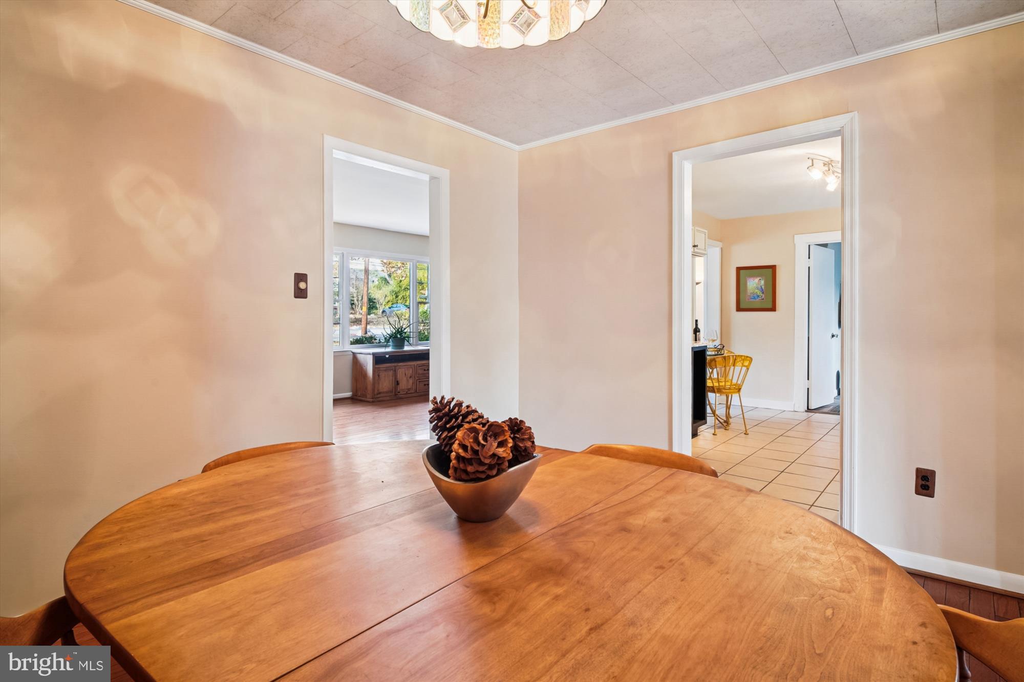 2845 Carrollton Road Annapolis, MD 21403 - Photo 17 of 47 a bedroom with a bed and a potted plant