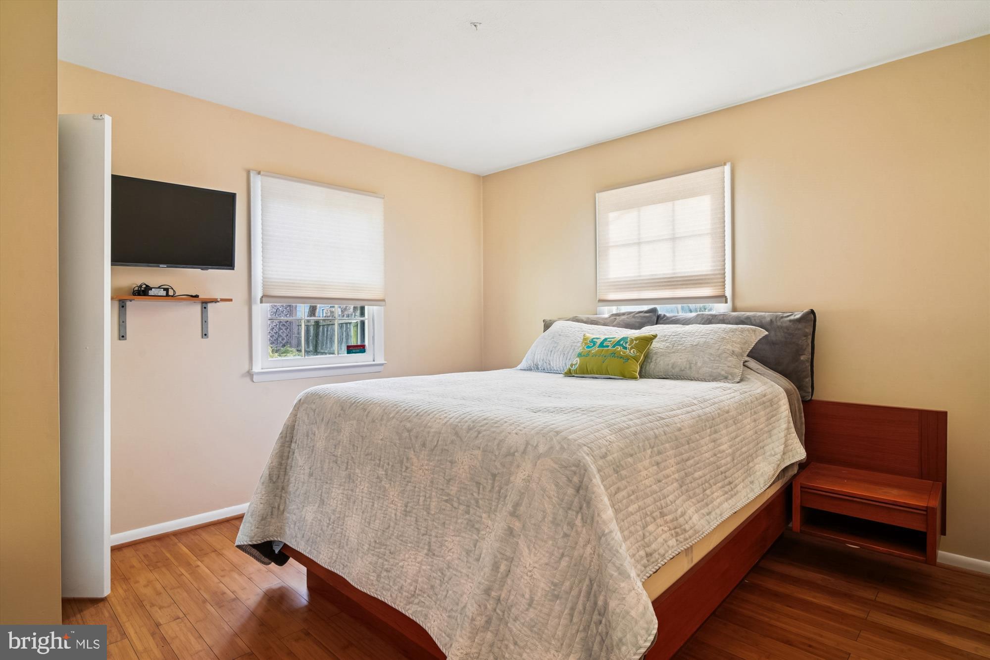 2845 Carrollton Road Annapolis, MD 21403 - Photo 20 of 47 a bedroom with a bed and a flat tv screen on dresser