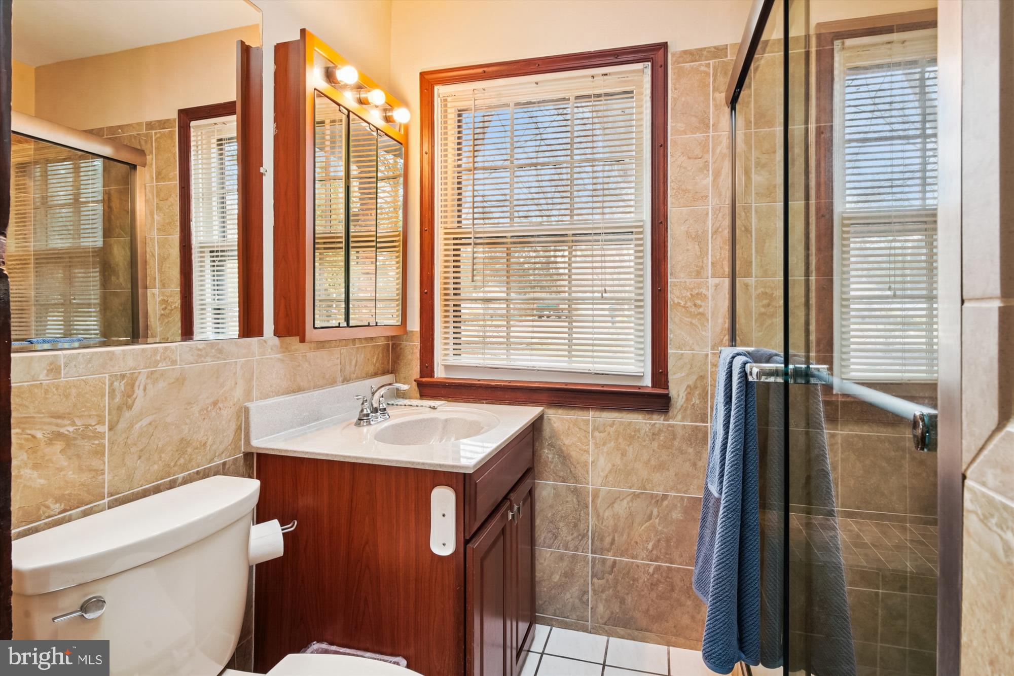 2845 Carrollton Road Annapolis, MD 21403 - Photo 22 of 47 a bathroom with a sink toilet and shower