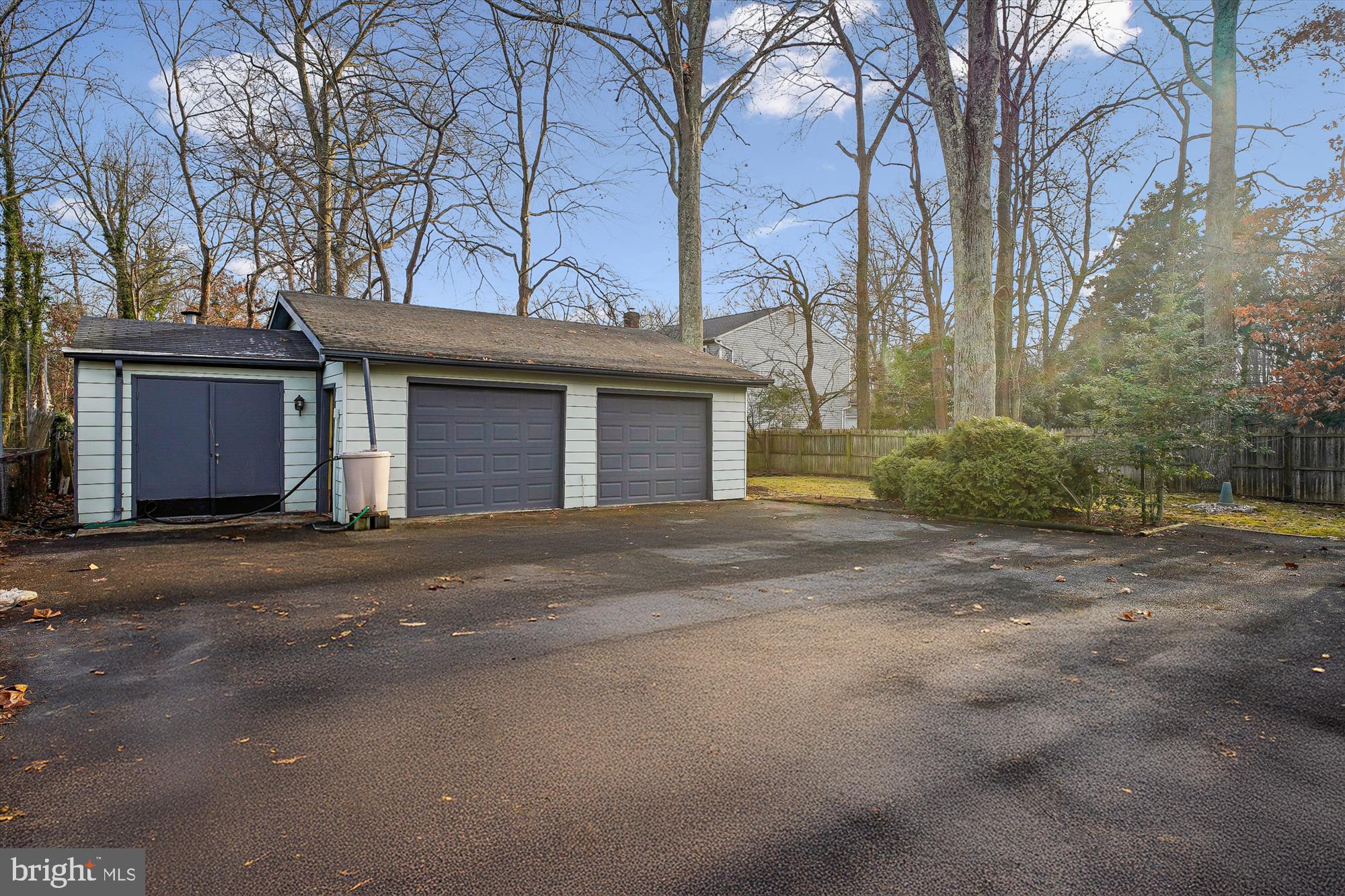 2845 Carrollton Road Annapolis, MD 21403 - Photo 30 of 47 a front view of a house with a yard and garage