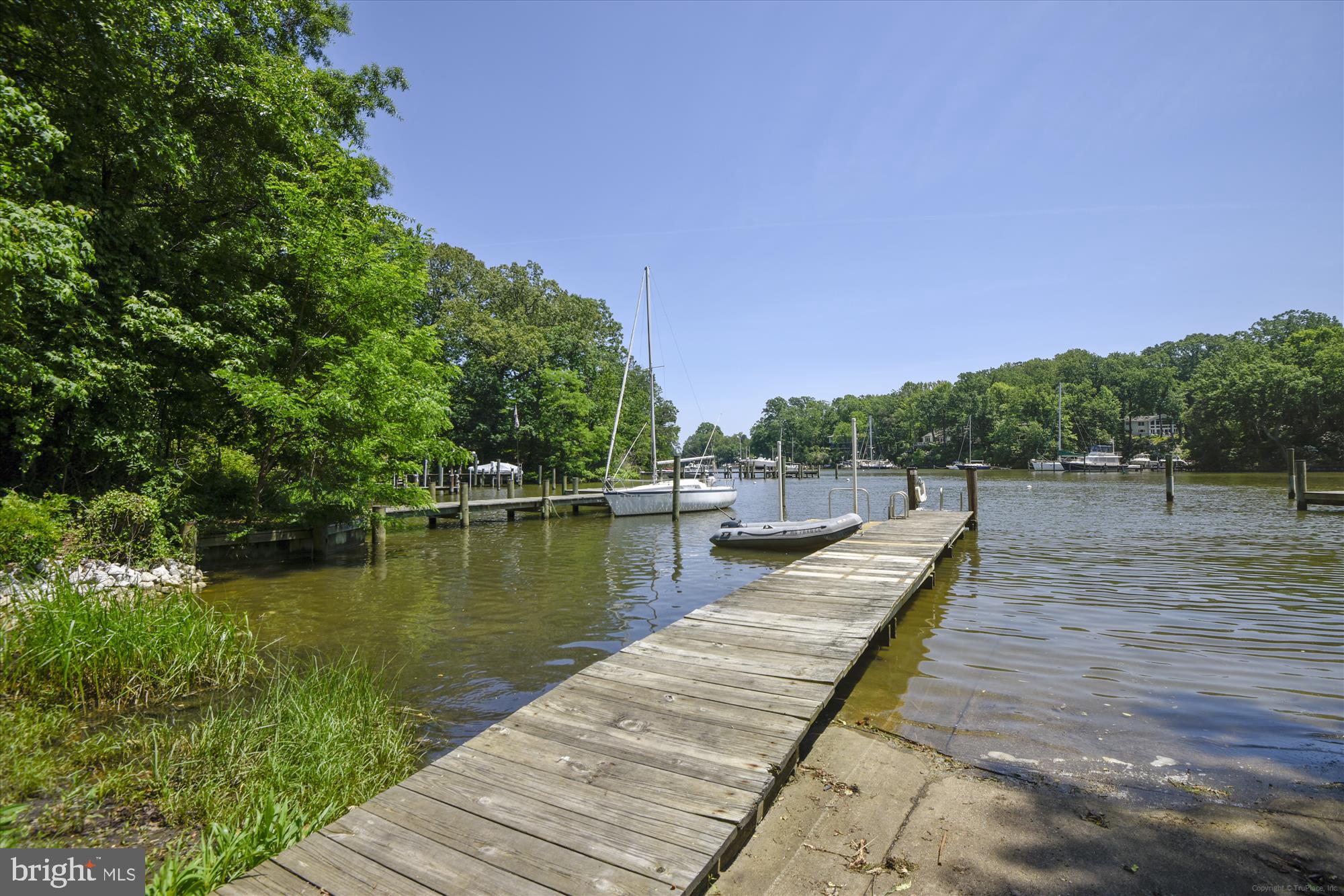 2845 Carrollton Road Annapolis, MD 21403 - Photo 38 of 47 a view of a lake with wooden stairs