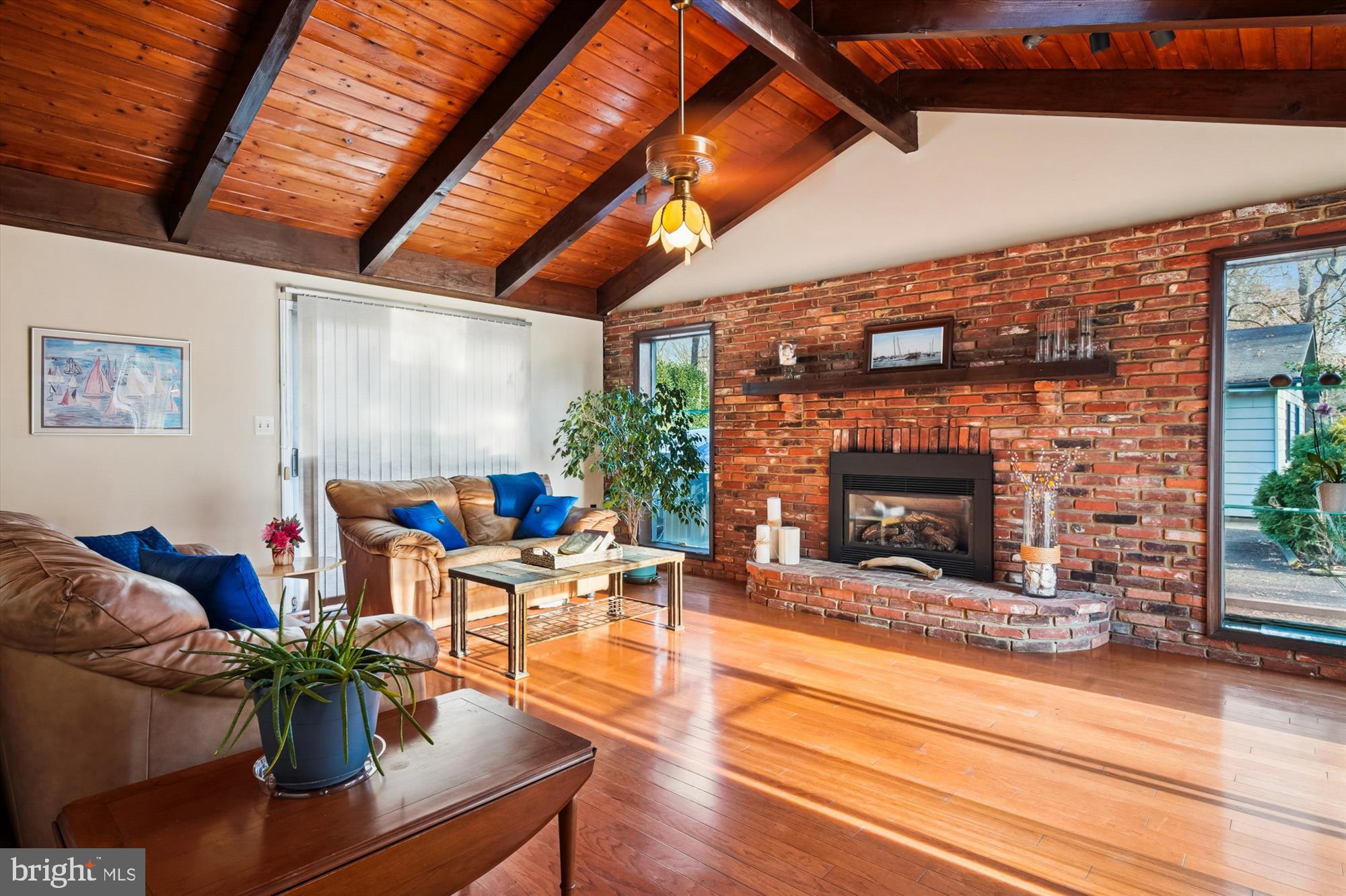 2845 Carrollton Road Annapolis, MD 21403 - Photo 7 of 47 a living room with furniture and a fireplace