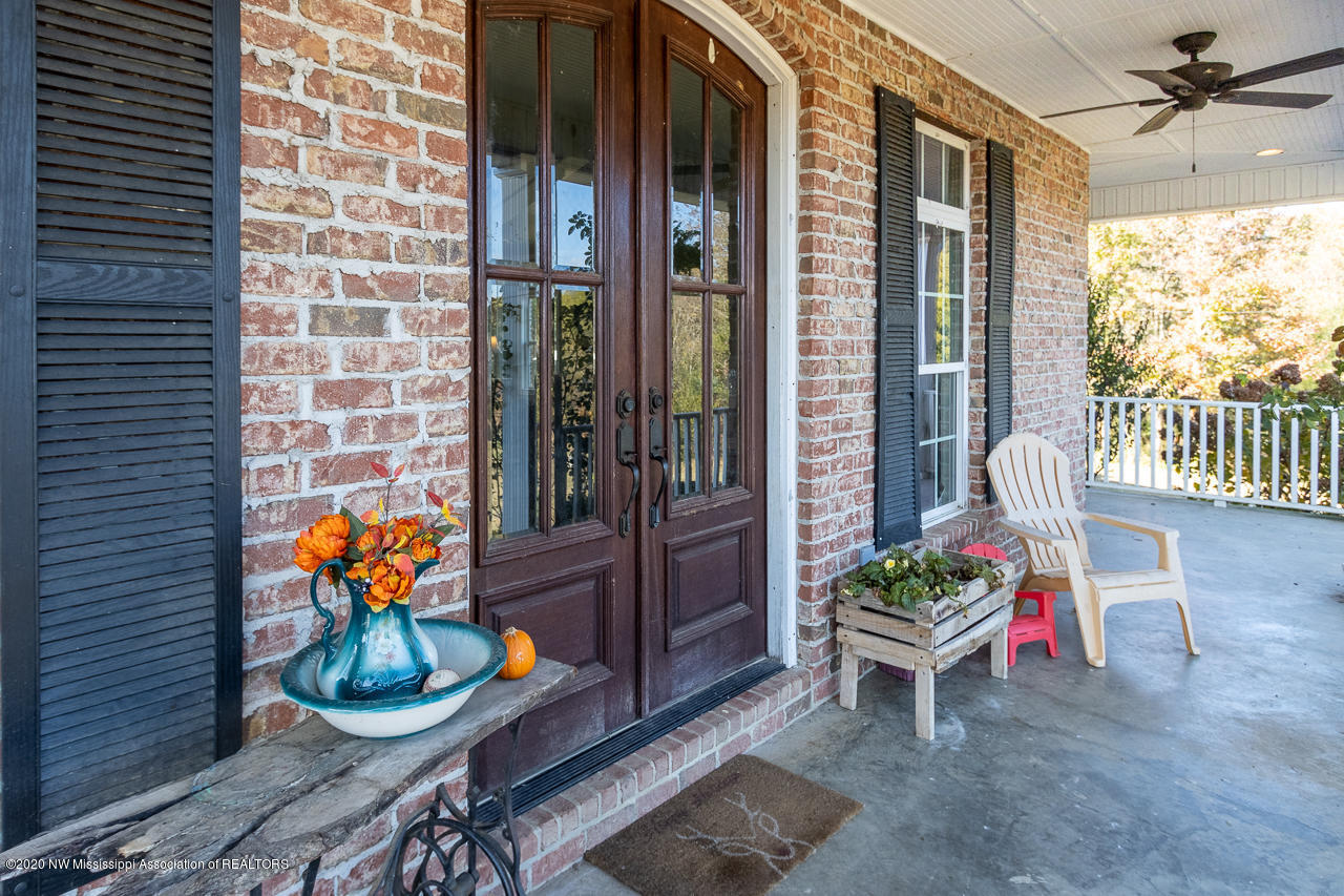14525 Leavell Road Byhalia, MS 38611 - Photo 4 of 38 Solid Double Doors wrap around porch