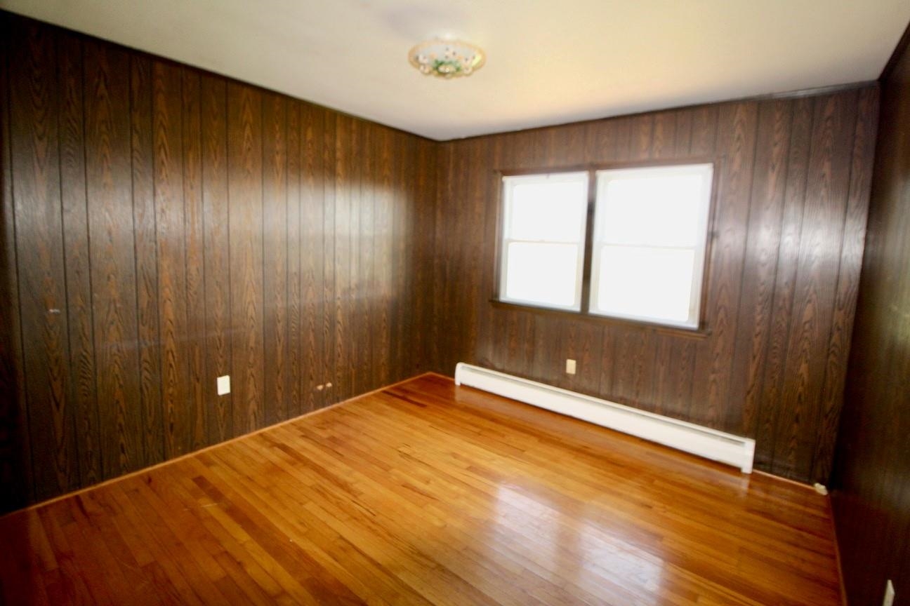 407 Mt Solon Road Mount Solon, VA 22843 - Photo 8 of 34 a view of empty room with wooden floor