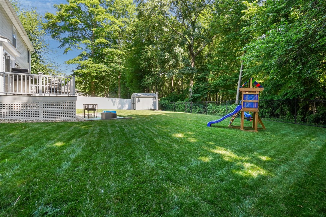 10 Loggers Run West Warwick, RI 02893 - Photo 25 of 27 Fenced in back yard and in ground sprinklers