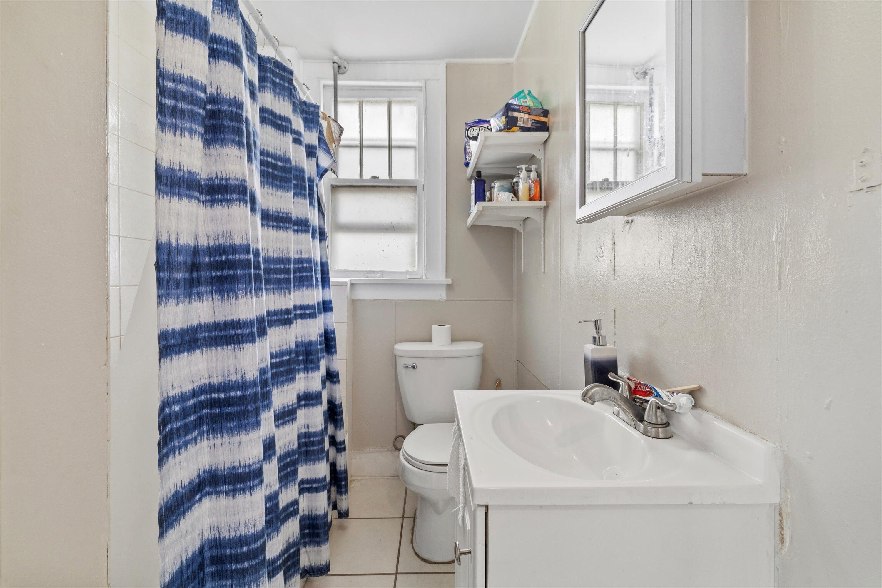 1220 North Wisconsin Street Racine, WI 53402 - Photo 20 of 24 Updated Bathroom