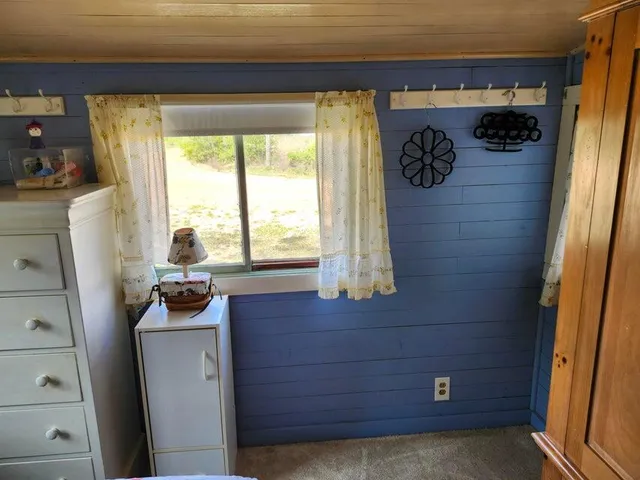 a bathroom with a tub and shower