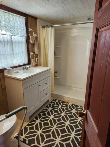 a room with furniture and a rug