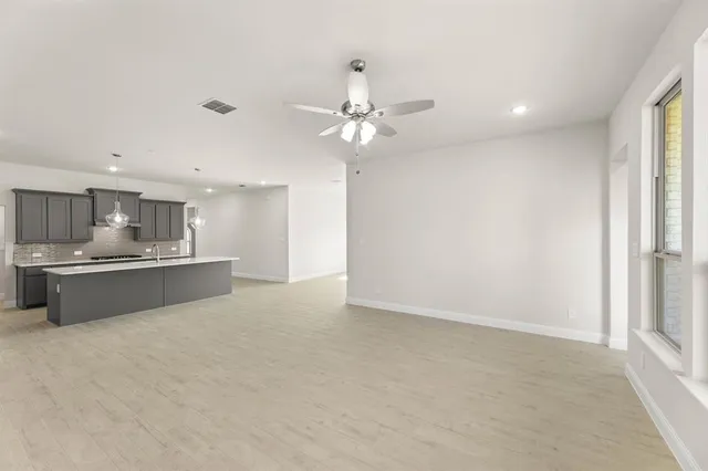 a view of kitchen and windows