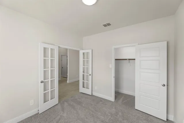 an empty room with closet