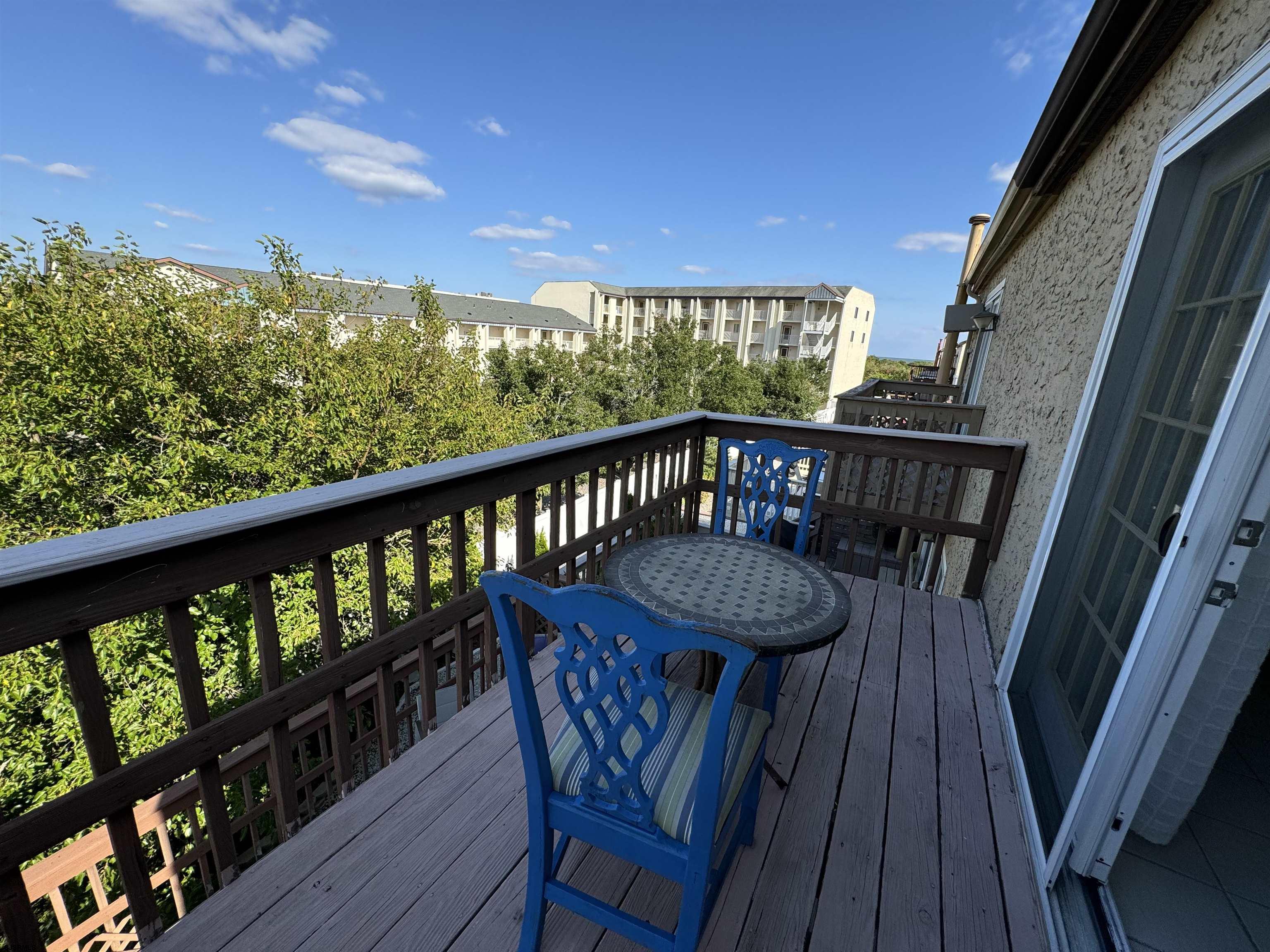 25 Beacon Lane Brigantine, NJ 08203 - Photo 30 of 36 a view of balcony with furniture and wooden deck