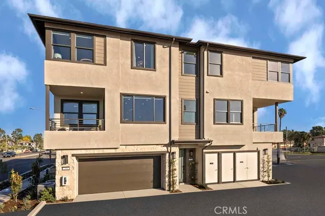 a front view of a house with a garage