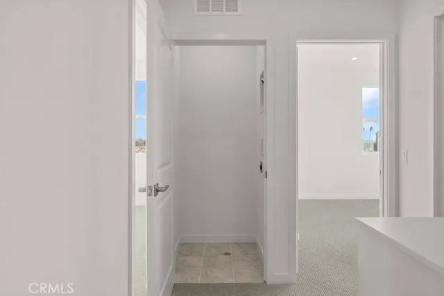 a view of an empty walk in closet