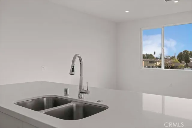 a close view of sink and natural light