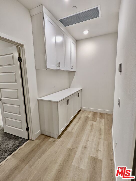 7107 Ryder Ln. Gardena, CA 90248 - Photo 10 of 11 a view of a hallway with staircase