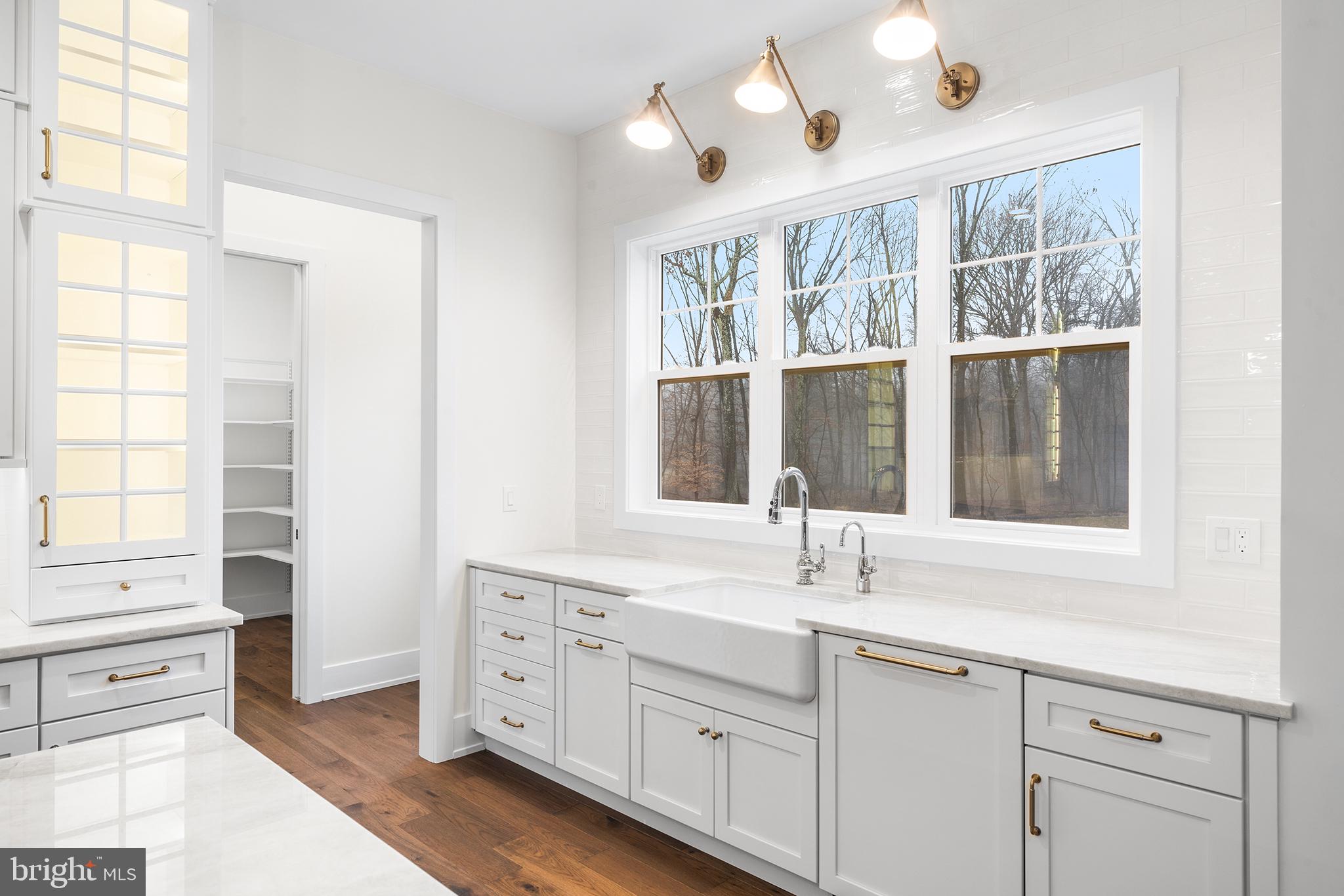 2 Pineville Road Newtown, PA 18940 - Photo 11 of 39 a kitchen with cabinets appliances and a window