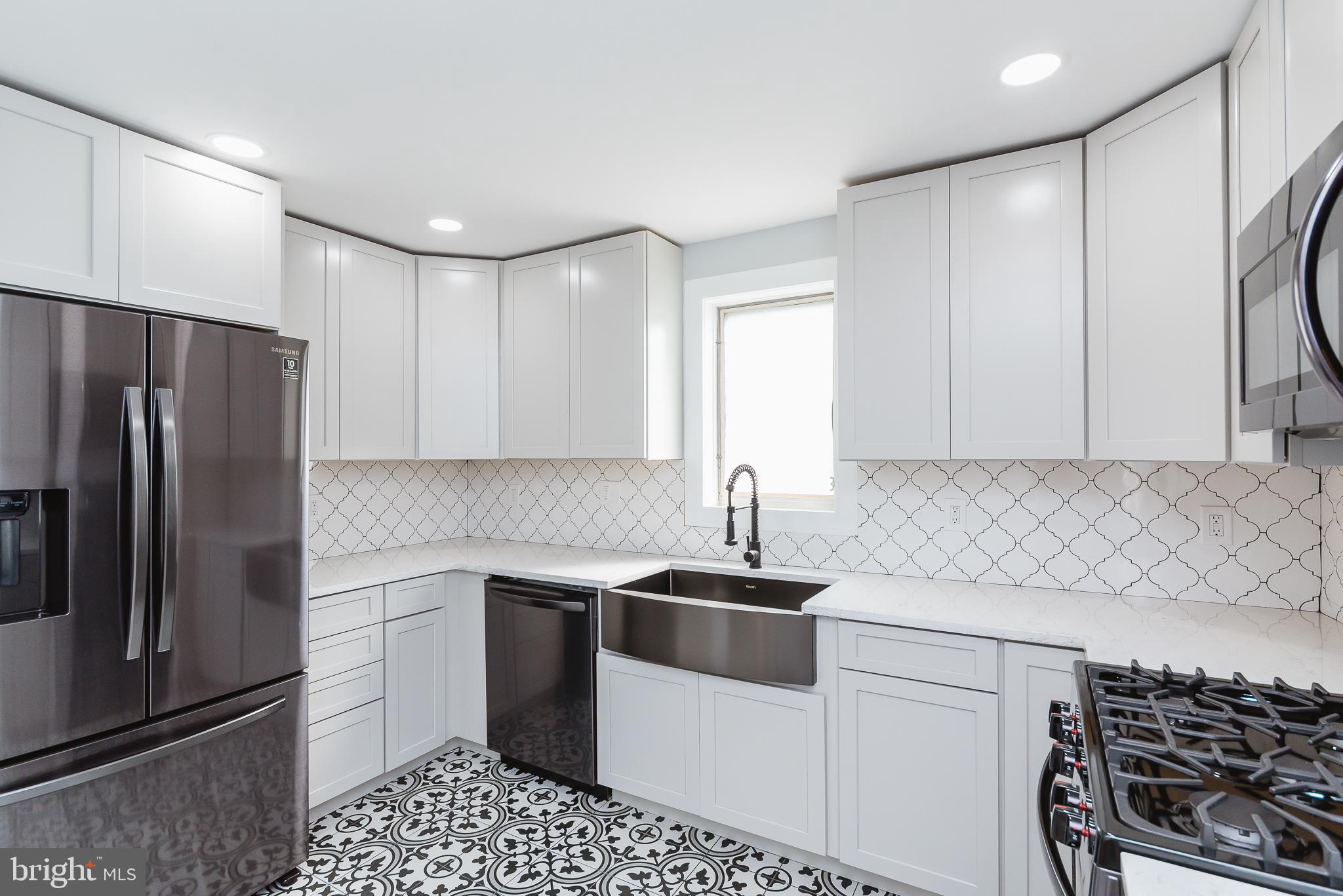 1713 Goodview Road Baltimore, MD 21234 - Photo 14 of 60 Custom Backsplash and Cabinets