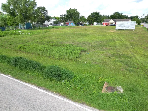 a view of a field with of water