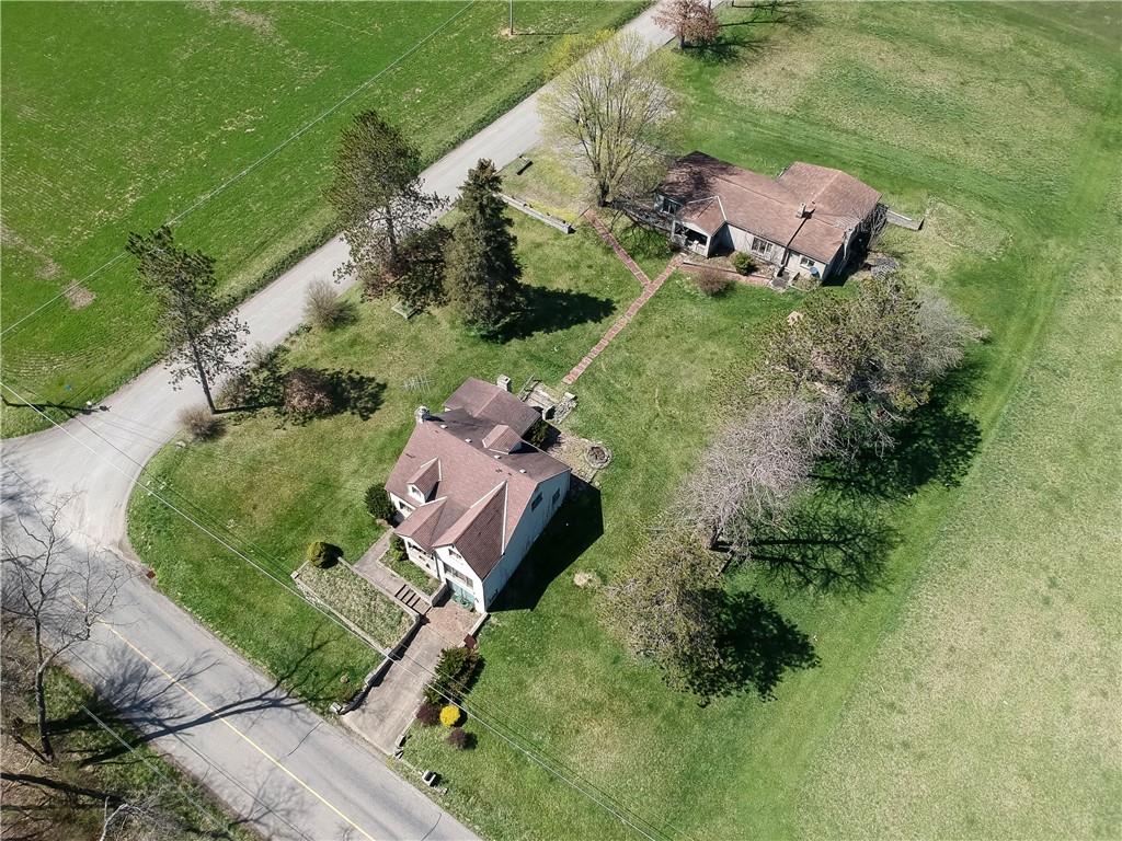 401 West Jefferson Road Butler, PA 16002 - Photo 3 of 22 an aerial view of a house with a garden