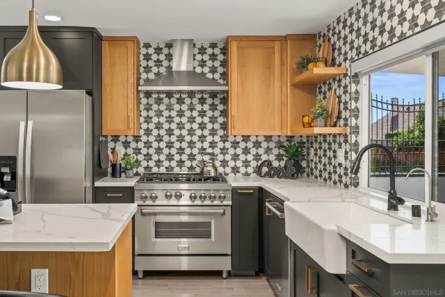 a kitchen with a sink stove and refrigerator