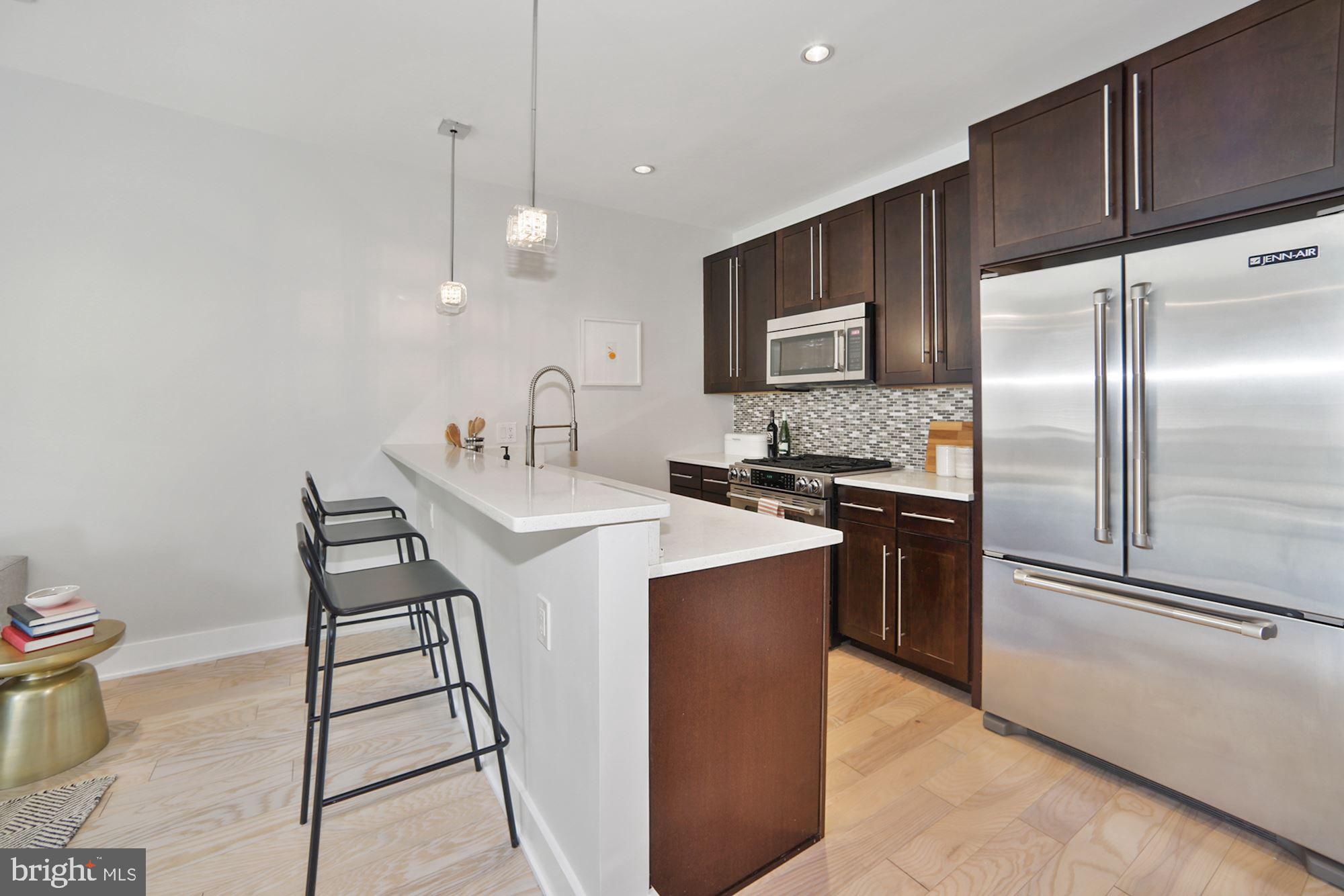 2101 11th Street Northwest, Unit 403 Washington, DC 20001 - Photo 3 of 25 Quartz Island perfect for casual family dining