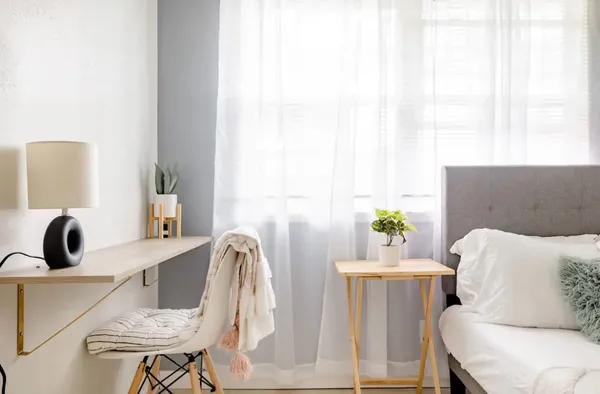 a view of dining room with furniture and window