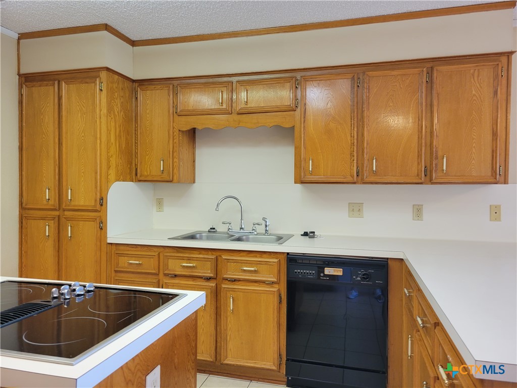 1511 Wild Ridge Drive Harker Heights, TX 76548 - Photo 14 of 29 a kitchen with stainless steel appliances granite countertop a sink and cabinets