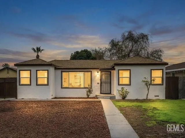 a front view of house with yard