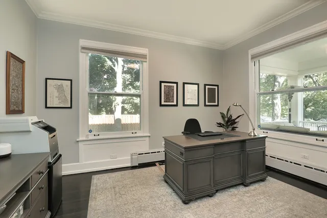 a living room with furniture and window