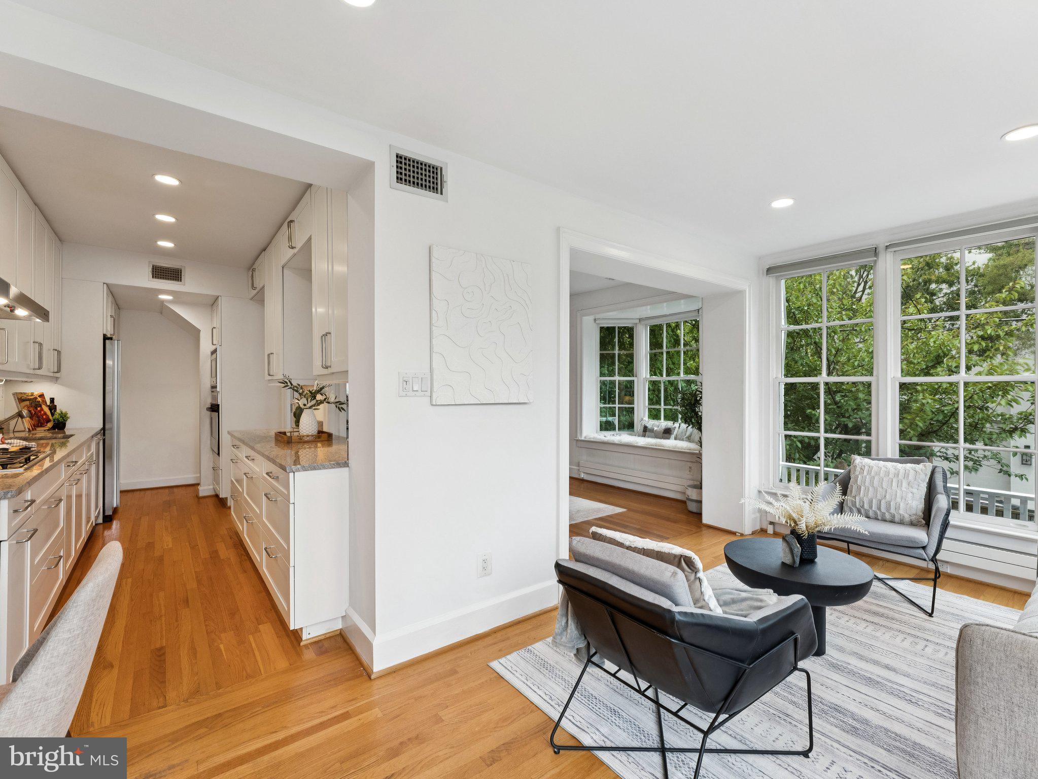3541 R Street Northwest Washington, DC 20007 - Photo 11 of 35 a living room with furniture and a table