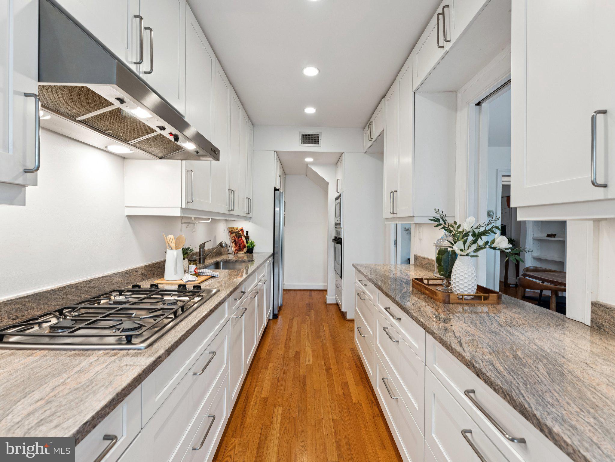 3541 R Street Northwest Washington, DC 20007 - Photo 14 of 35 a kitchen with sink stove and refrigerator