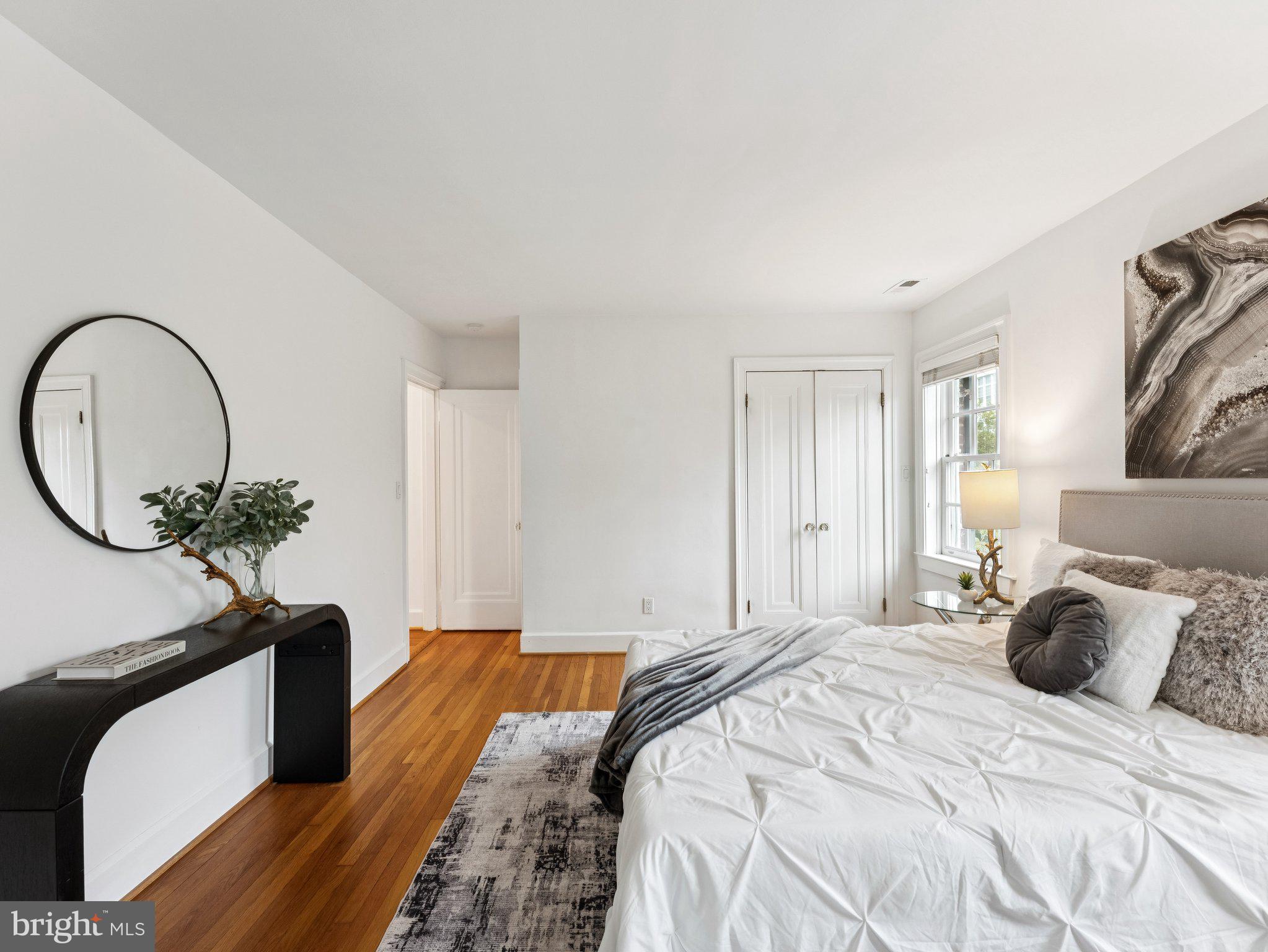 3541 R Street Northwest Washington, DC 20007 - Photo 19 of 35 a bedroom with bed and a potted plant
