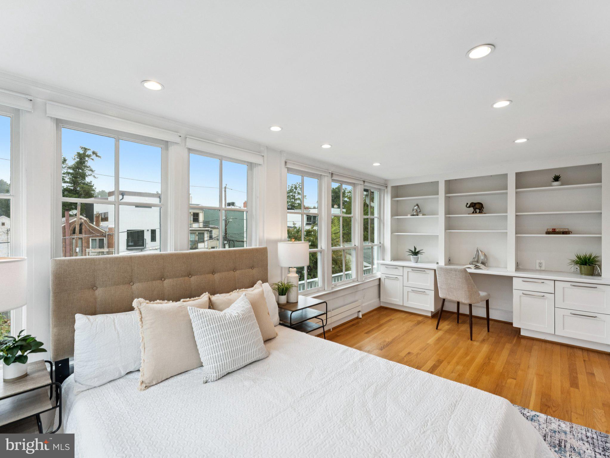 3541 R Street Northwest Washington, DC 20007 - Photo 21 of 35 a living room with furniture and a table with wooden floor