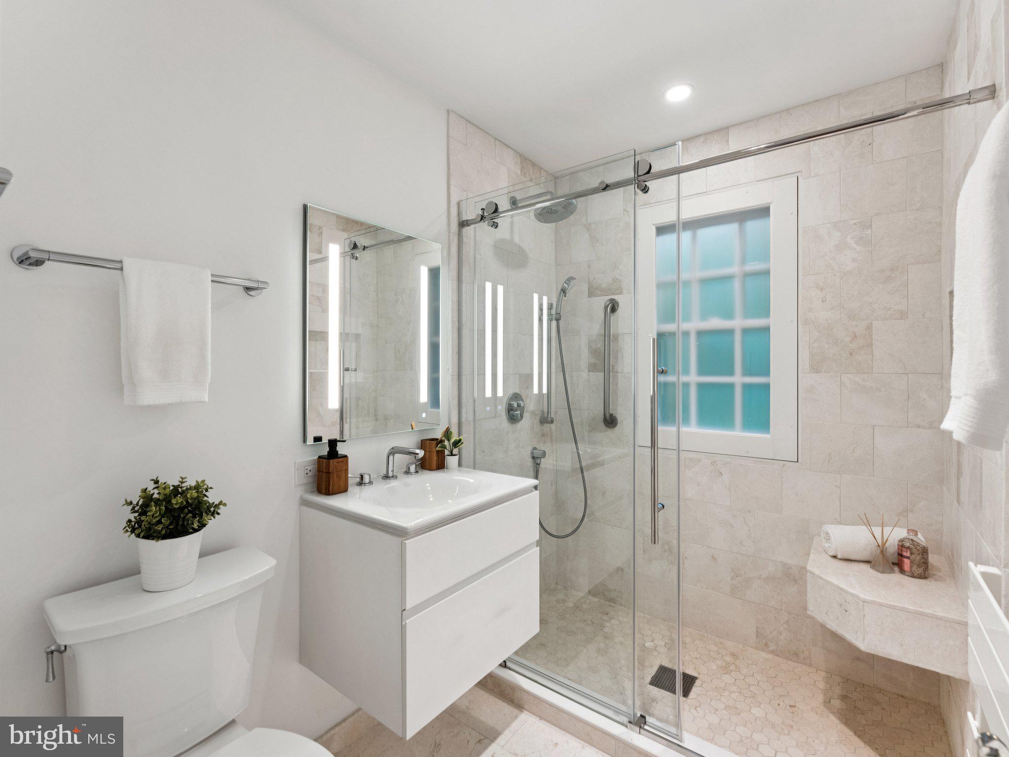 3541 R Street Northwest Washington, DC 20007 - Photo 24 of 35 a bathroom with a sink toilet and shower