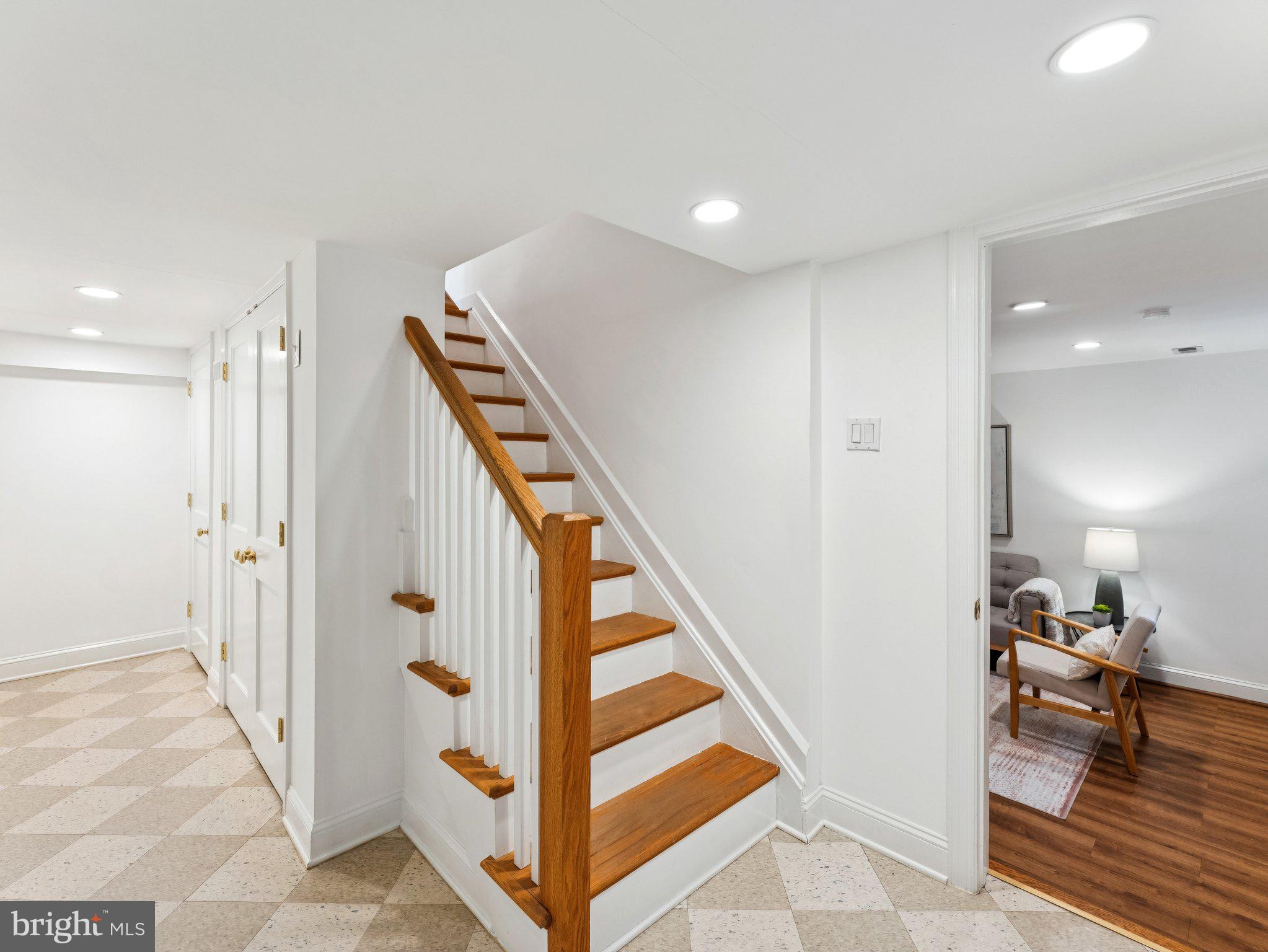 3541 R Street Northwest Washington, DC 20007 - Photo 25 of 35 a view of an entryway with wooden floor and a hallway