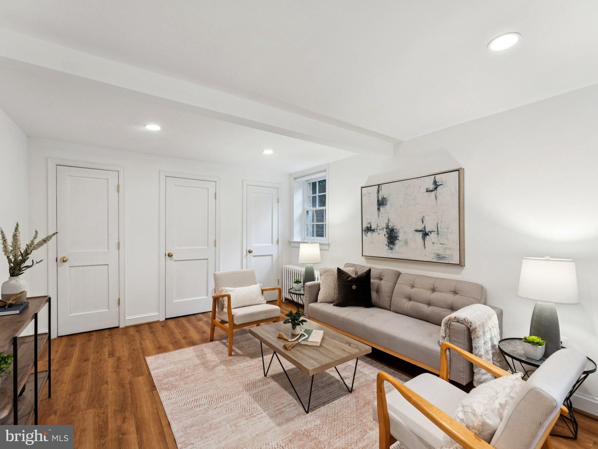 3541 R Street Northwest Washington, DC 20007 - Photo 26 of 35 a living room with furniture and wooden floor